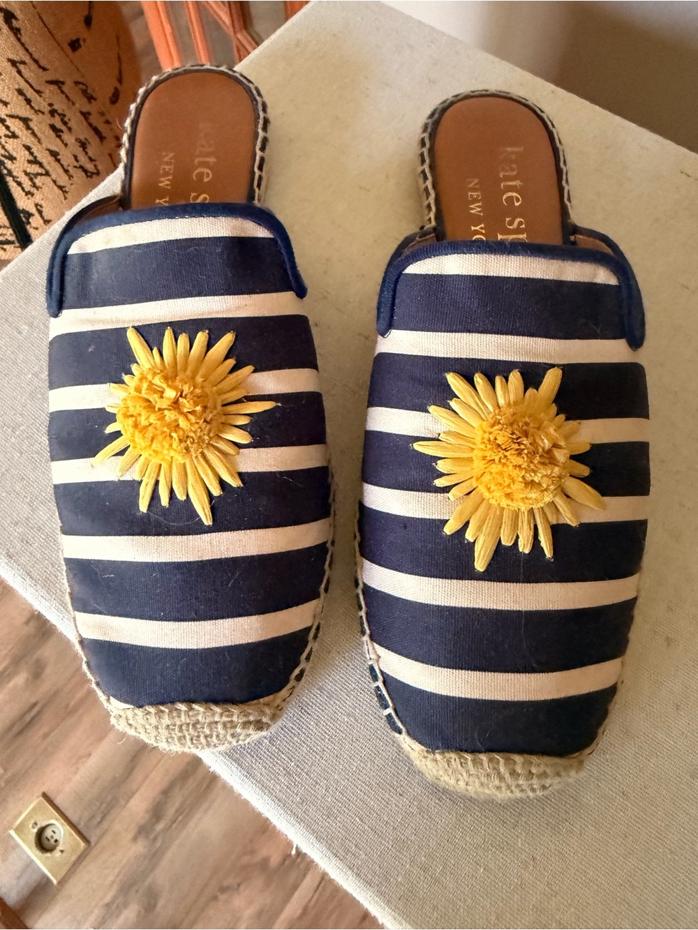 kate spade navy and white striped mules with yellow floral appliqué
